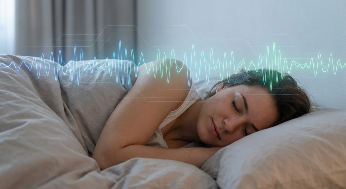 A person sleeping peacefully with brain wave patterns overlay.
